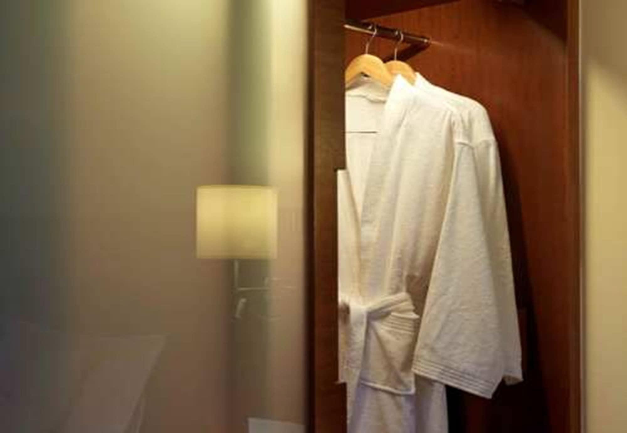 One World Hotel Petaling Jaya Exterior photo A bathrobe hanging on a door